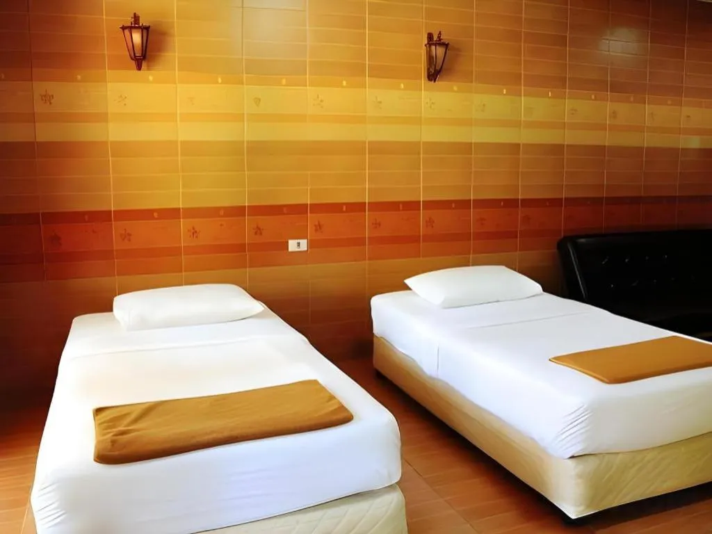 Bed in Saikaew Boutique Hotel