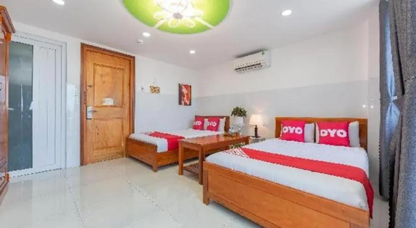 Bed in OYO 1028 Flower House Apartment