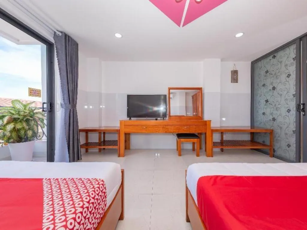 Bed in OYO 1028 Flower House Apartment