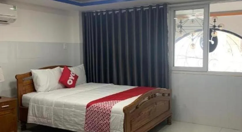 Bed in OYO 1028 Flower House Apartment