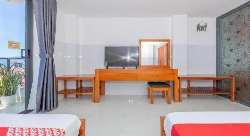 Bed in OYO 1028 Flower House Apartment