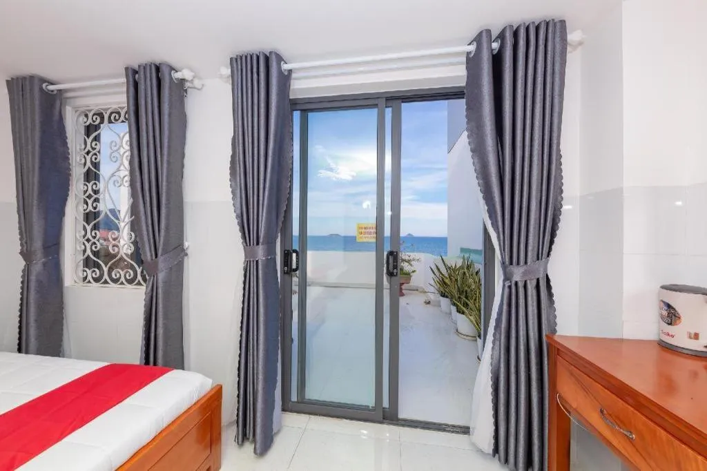 Bed in OYO 1028 Flower House Apartment