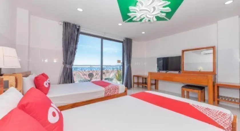 Bed in OYO 1028 Flower House Apartment