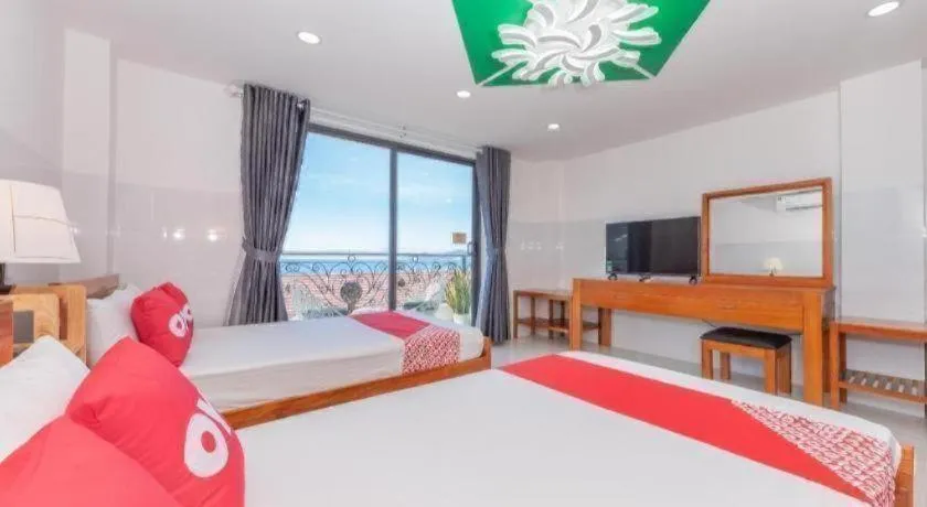 Bed in OYO 1028 Flower House Apartment