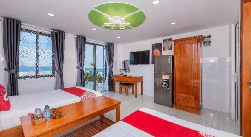 Bed in OYO 1028 Flower House Apartment