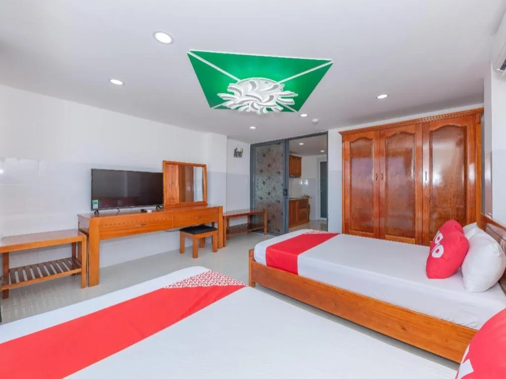 Bed in OYO 1028 Flower House Apartment