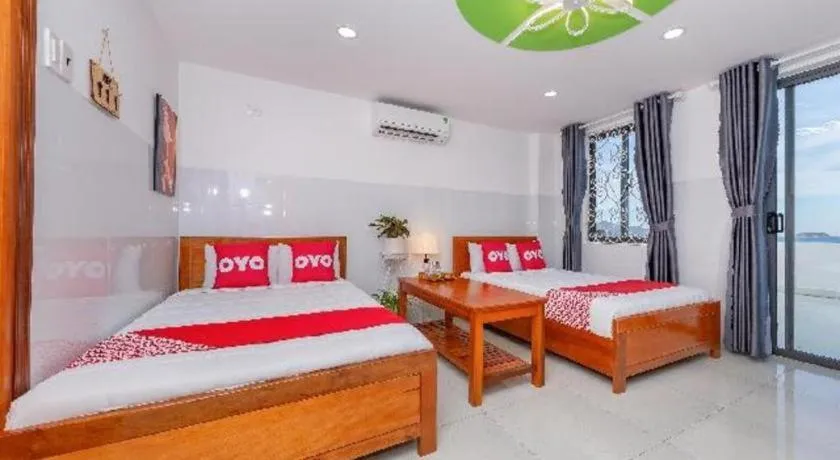 Bed in OYO 1028 Flower House Apartment