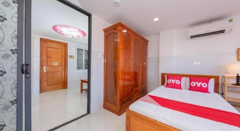 Bed in OYO 1028 Flower House Apartment