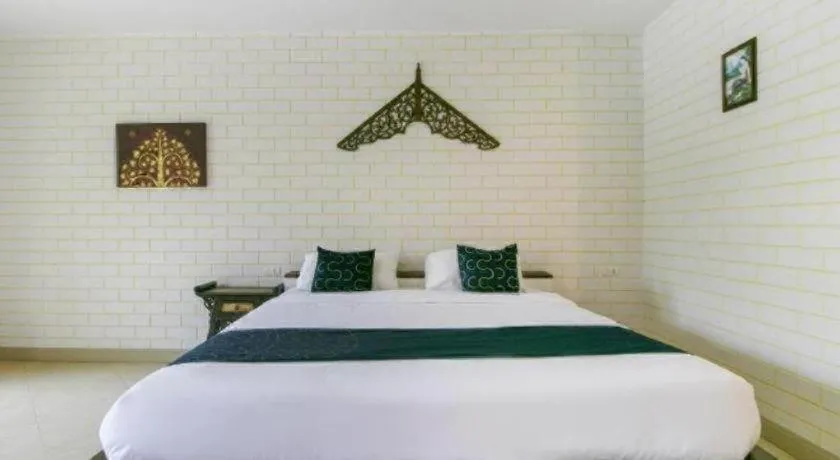 Bed in CAPITAL O961 Baan Dow Chompoo Resort