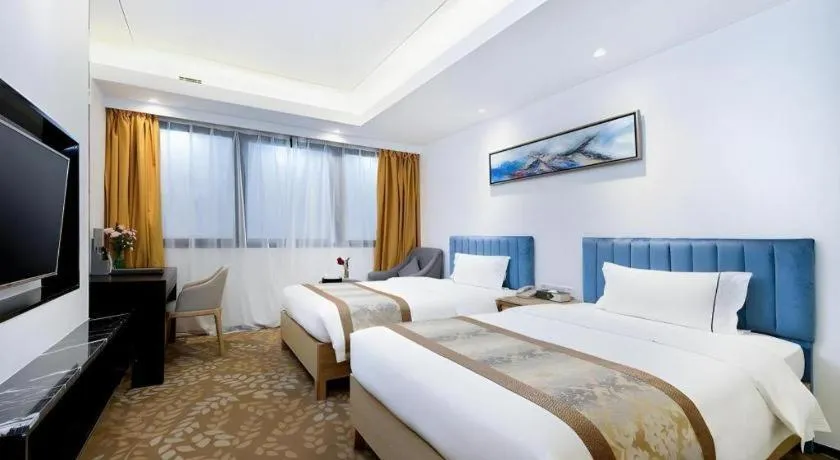 Bed in Golden Central Hotel Shenzhen