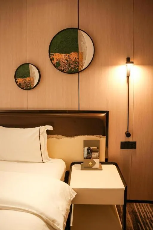 Bed in Golden Central Hotel Shenzhen