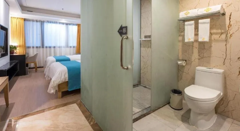 Bed in Golden Central Hotel Shenzhen