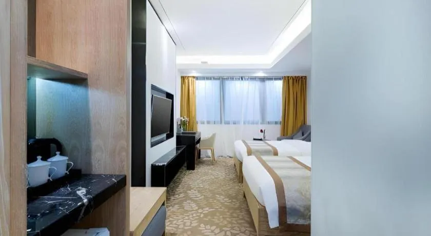 Bed in Golden Central Hotel Shenzhen