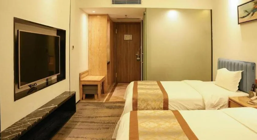 Bed in Golden Central Hotel Shenzhen