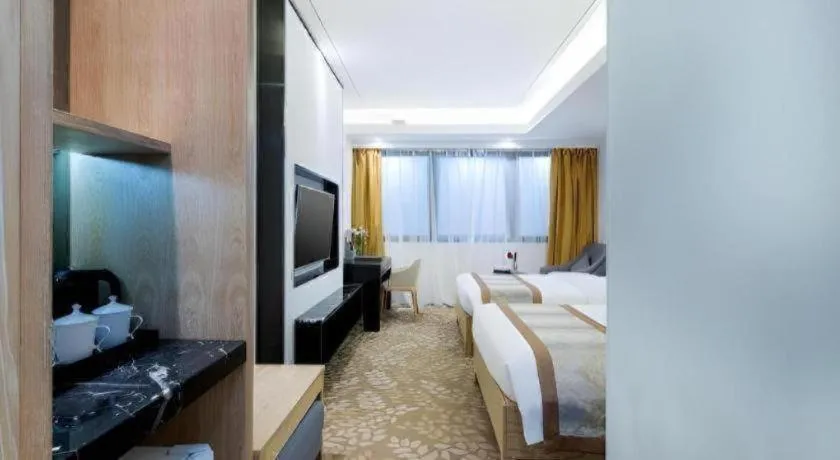 Bed in Golden Central Hotel Shenzhen