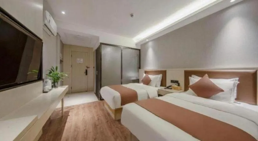 Bed in Gya Hotel Shanghai Long Distance Passenger Terminal Station