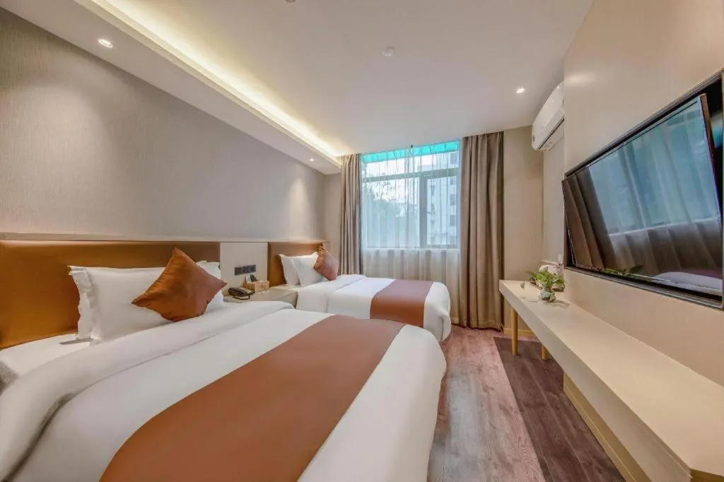 Bed in Gya Hotel Shanghai Long Distance Passenger Terminal Station