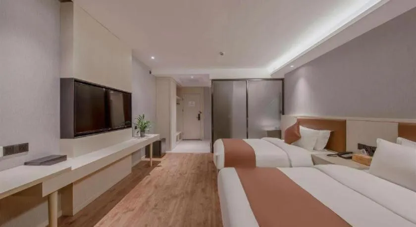 Bed in Gya Hotel Shanghai Long Distance Passenger Terminal Station