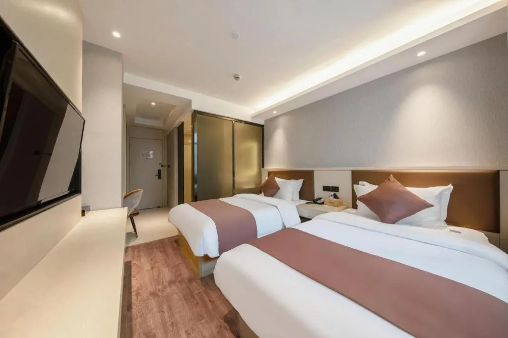 Bed in Gya Hotel Shanghai Long Distance Passenger Terminal Station