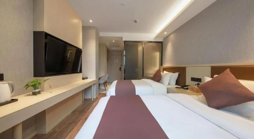 Bed in Gya Hotel Shanghai Long Distance Passenger Terminal Station