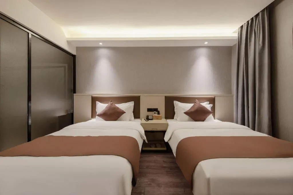 Bed in Gya Hotel Shanghai Long Distance Passenger Terminal Station