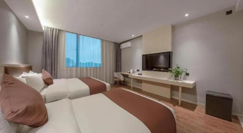 Bed in Gya Hotel Shanghai Long Distance Passenger Terminal Station