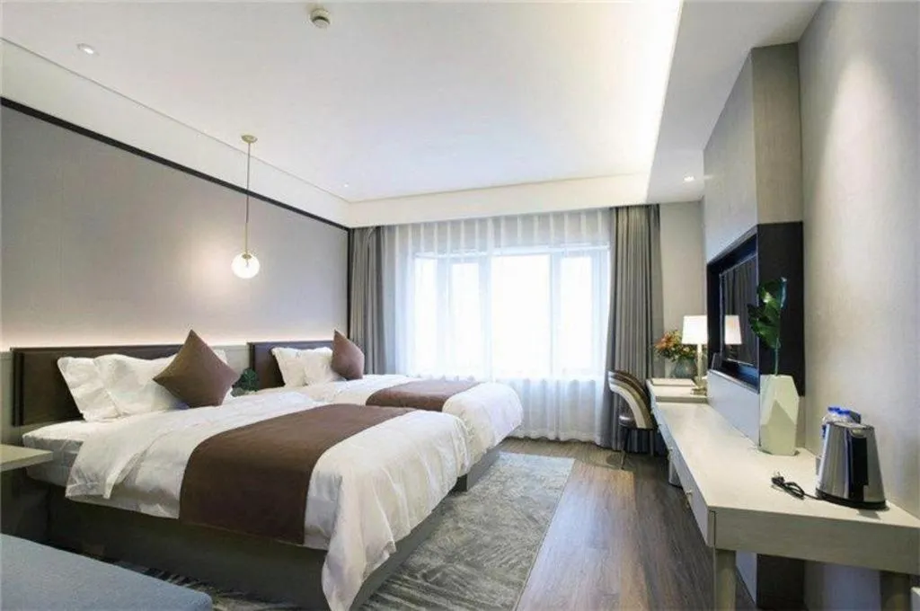 Bed in Gya Hotel Shanghai Long Distance Passenger Terminal Station