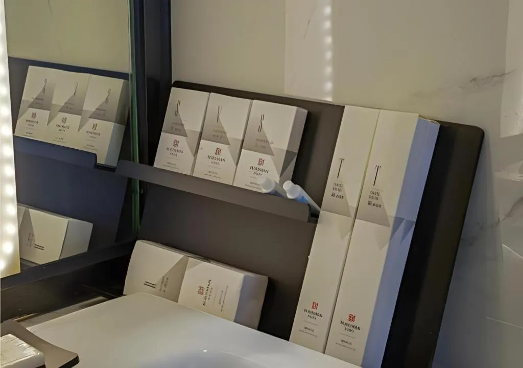 Bed in Borrman Hotel Zhaoqing Sihui Tianguangxu Jade City