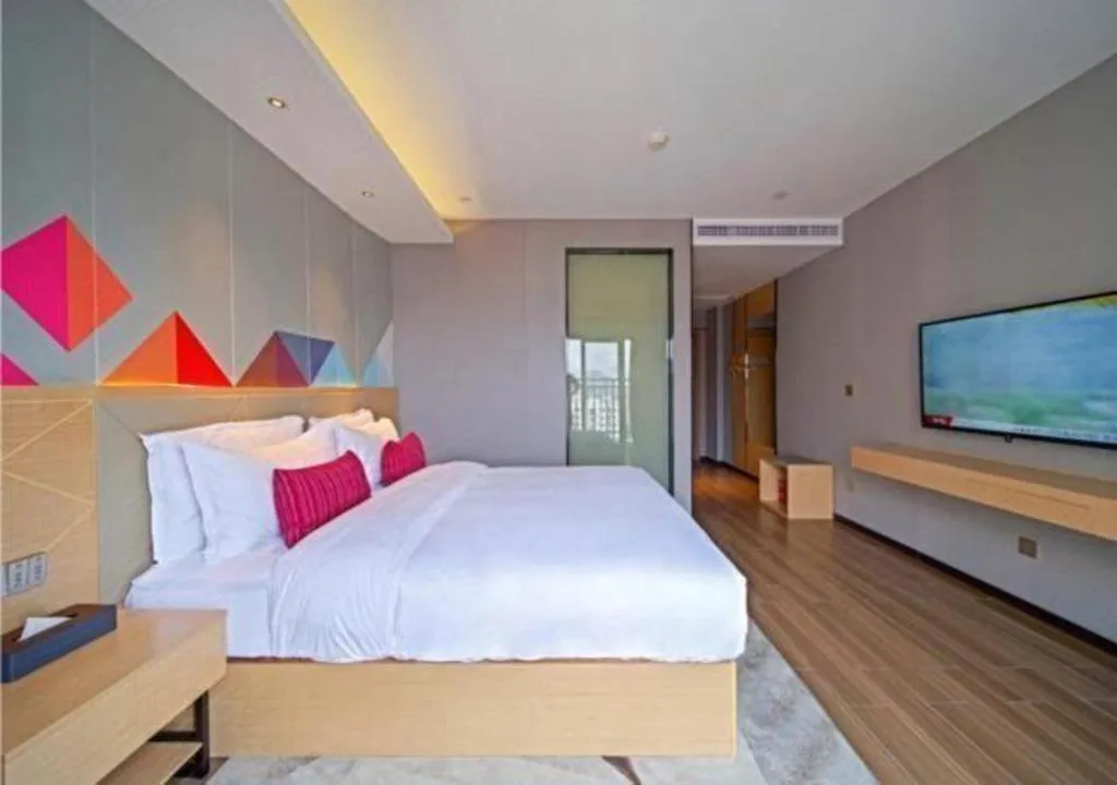Bed in Borrman Hotel Zhaoqing Sihui Tianguangxu Jade City