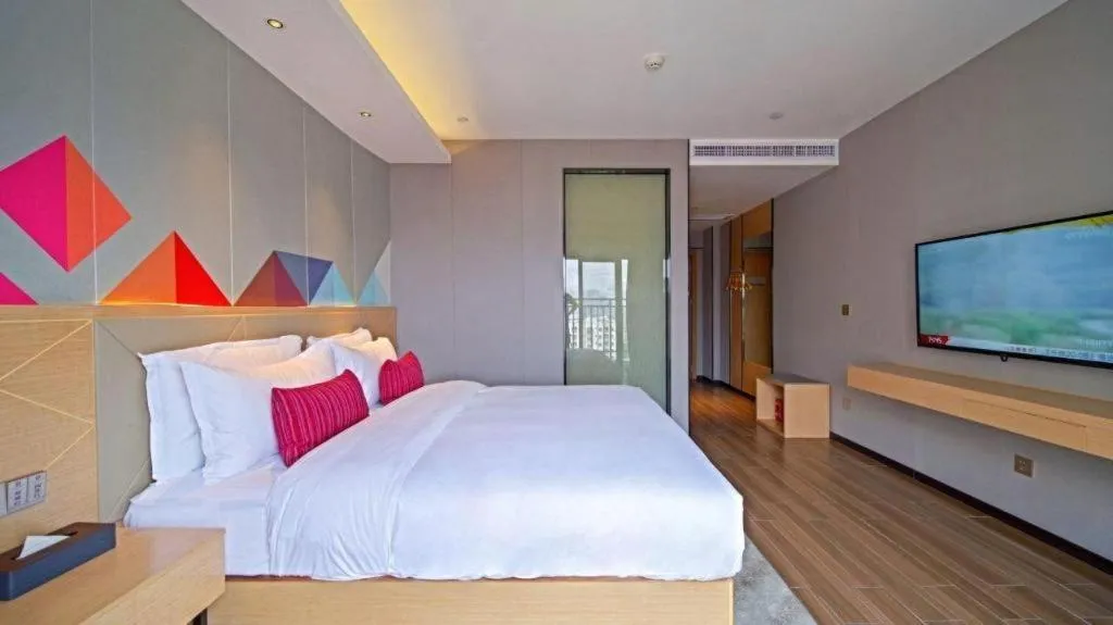 Bed in Borrman Hotel Zhaoqing Sihui Tianguangxu Jade City