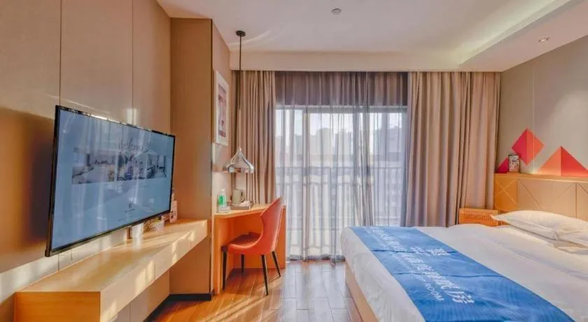 Bed in Borrman Hotel Zhaoqing Sihui Tianguangxu Jade City