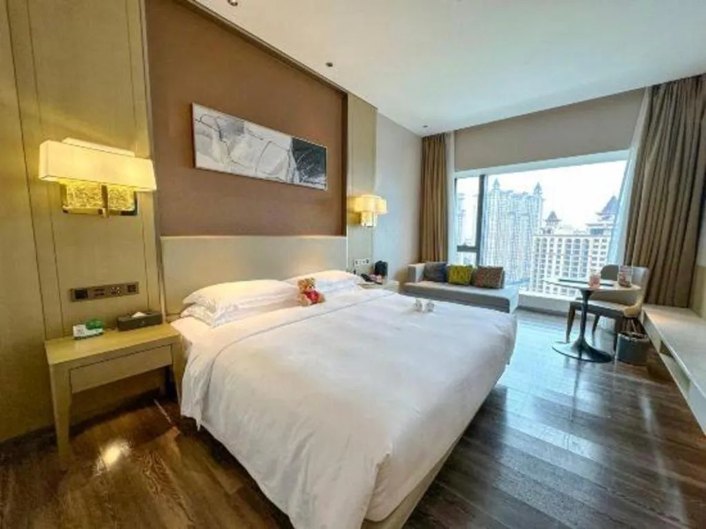 Bed in Derayco Hotel Foshan