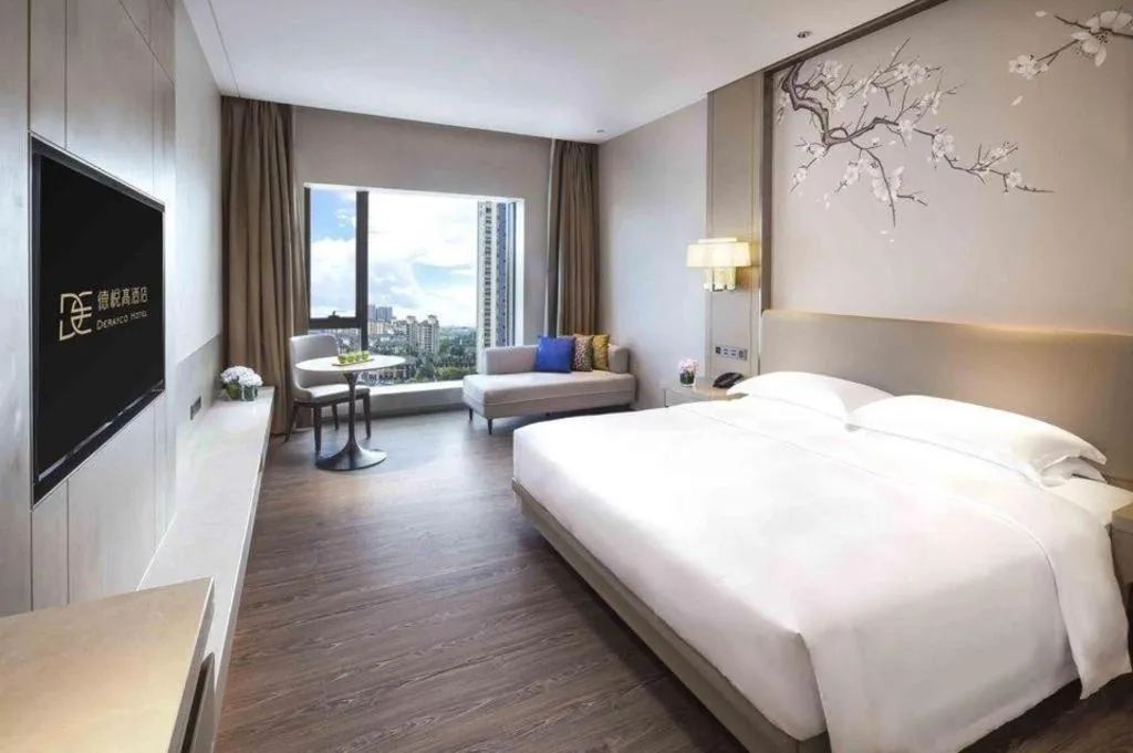 Bed in Derayco Hotel Foshan