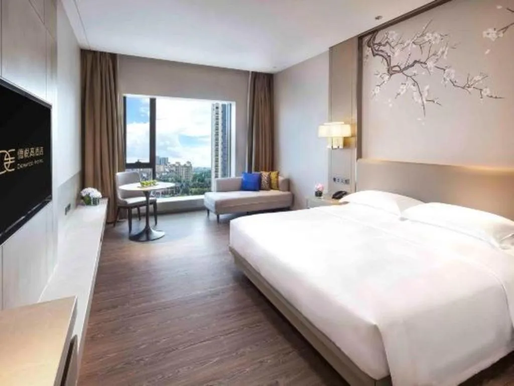 Bed in Derayco Hotel Foshan