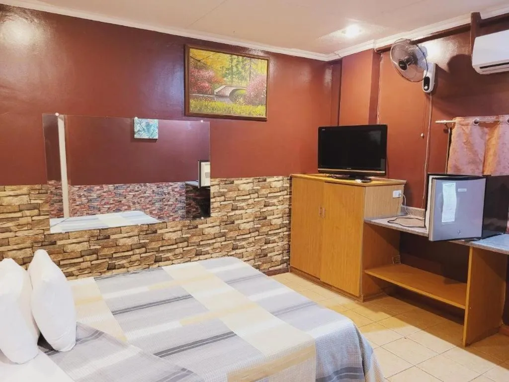 Bed in Walk Around Hotel