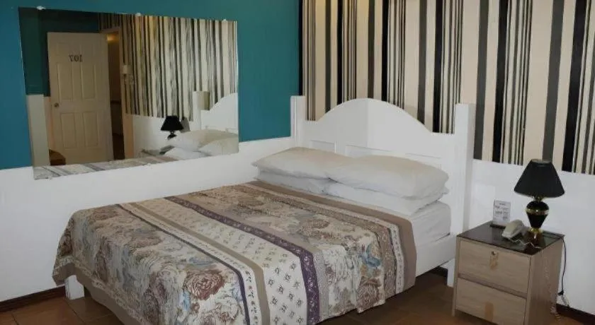 Bed in Walk Around Hotel