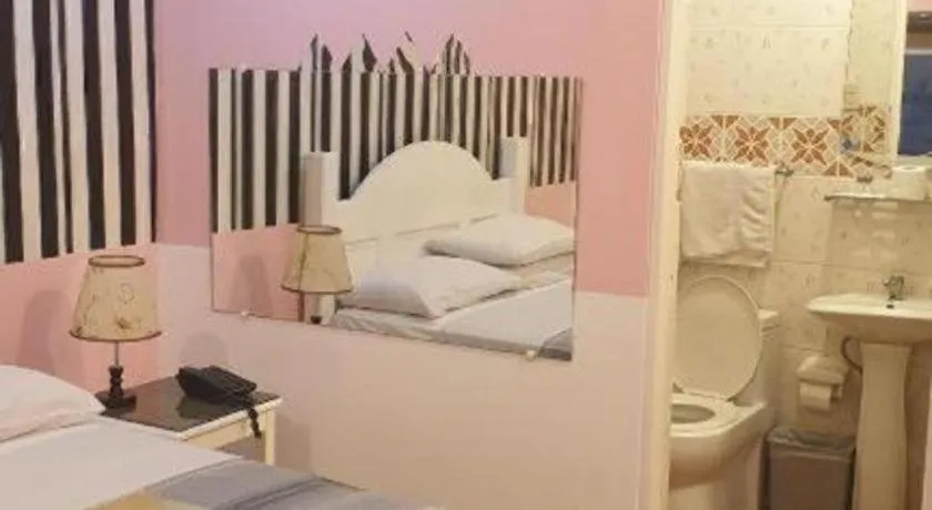 Bed in Walk Around Hotel