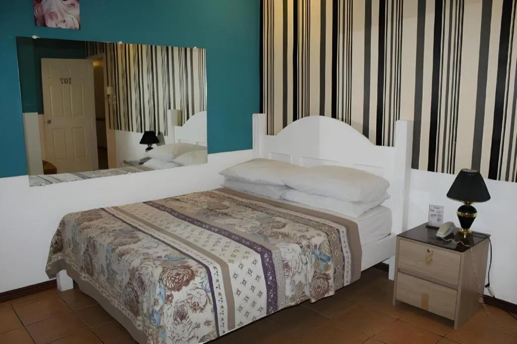 Bed in Walk Around Hotel