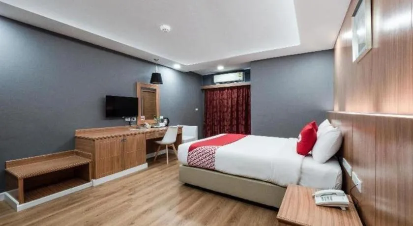 Bed in OYO 1126 Curve Boutique Pattaya