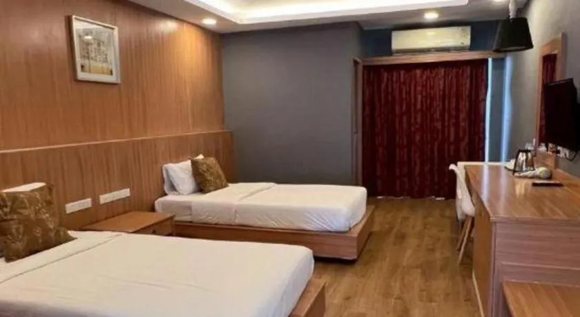 Bed in OYO 1126 Curve Boutique Pattaya