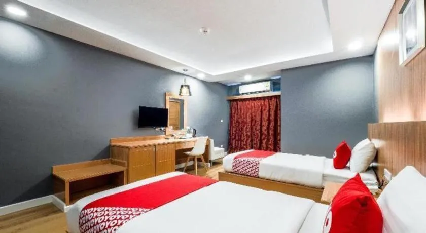 Bed in OYO 1126 Curve Boutique Pattaya