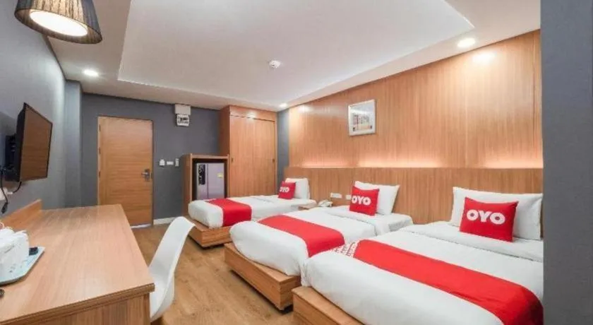 Bed in OYO 1126 Curve Boutique Pattaya