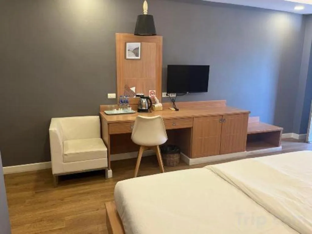 Bed in OYO 1126 Curve Boutique Pattaya