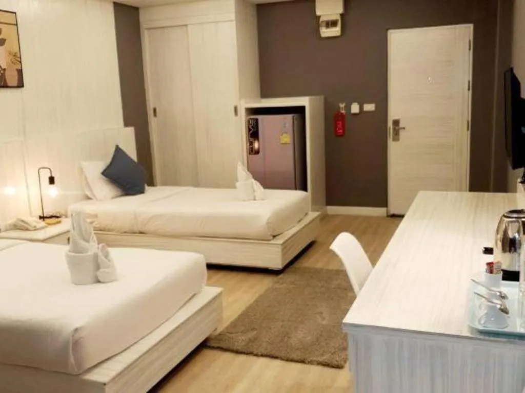 Bed in OYO 1126 Curve Boutique Pattaya