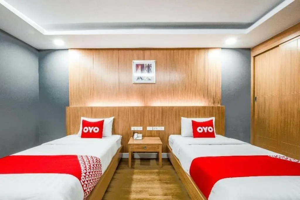 Bed in OYO 1126 Curve Boutique Pattaya