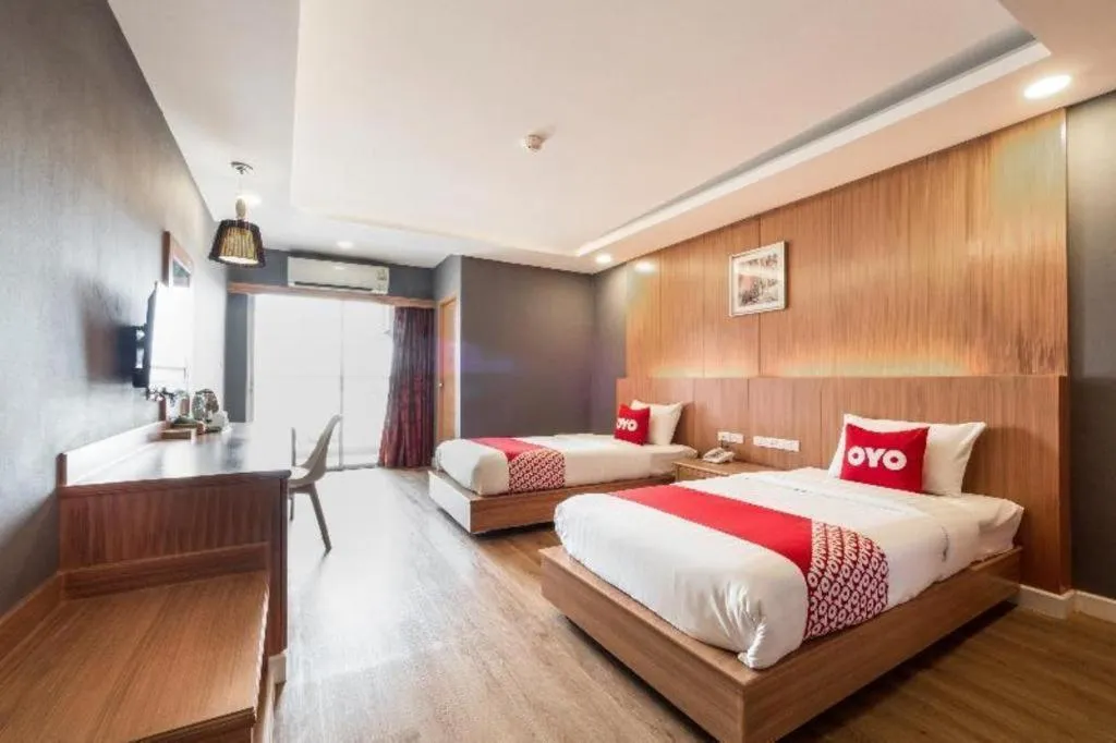 Bed in OYO 1126 Curve Boutique Pattaya