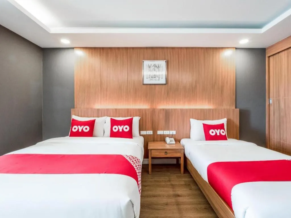 Bed in OYO 1126 Curve Boutique Pattaya
