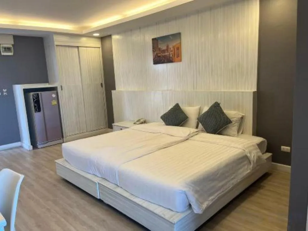 Bed in OYO 1126 Curve Boutique Pattaya