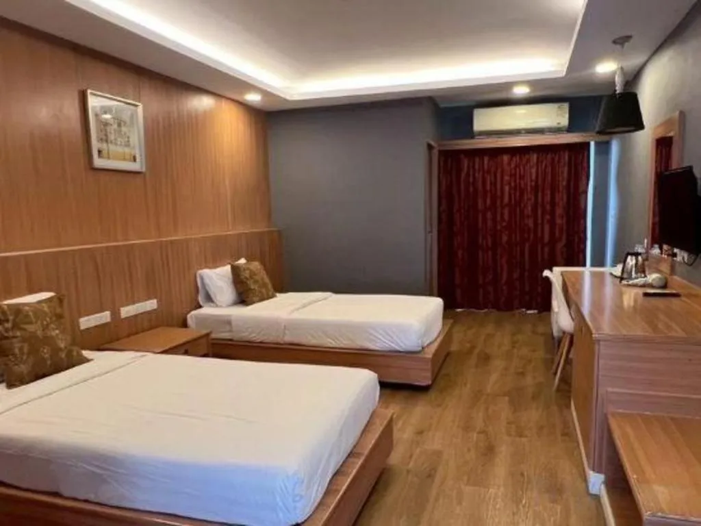 Bed in OYO 1126 Curve Boutique Pattaya