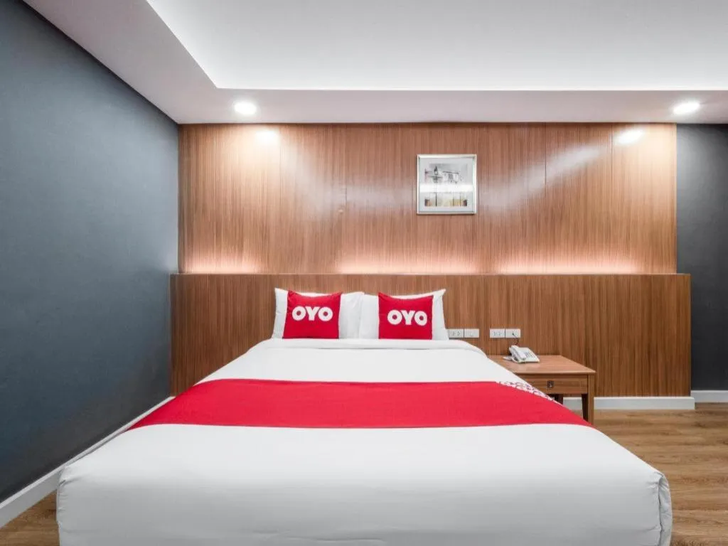 Bed in OYO 1126 Curve Boutique Pattaya